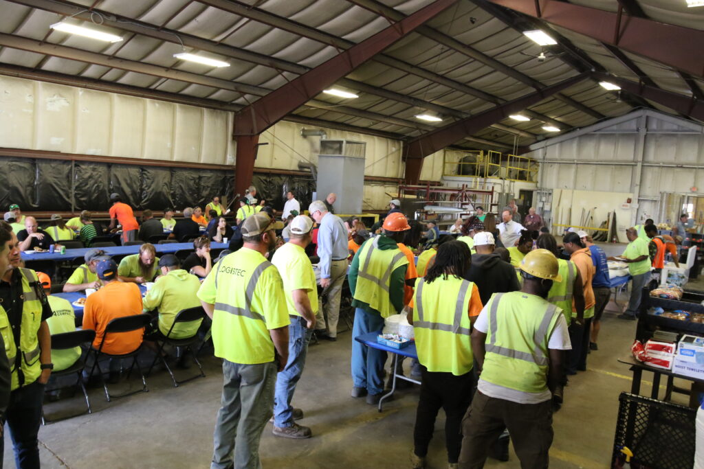 Before the outdoor celebration, ILA and IUOE members enjoy a lunch in their honor